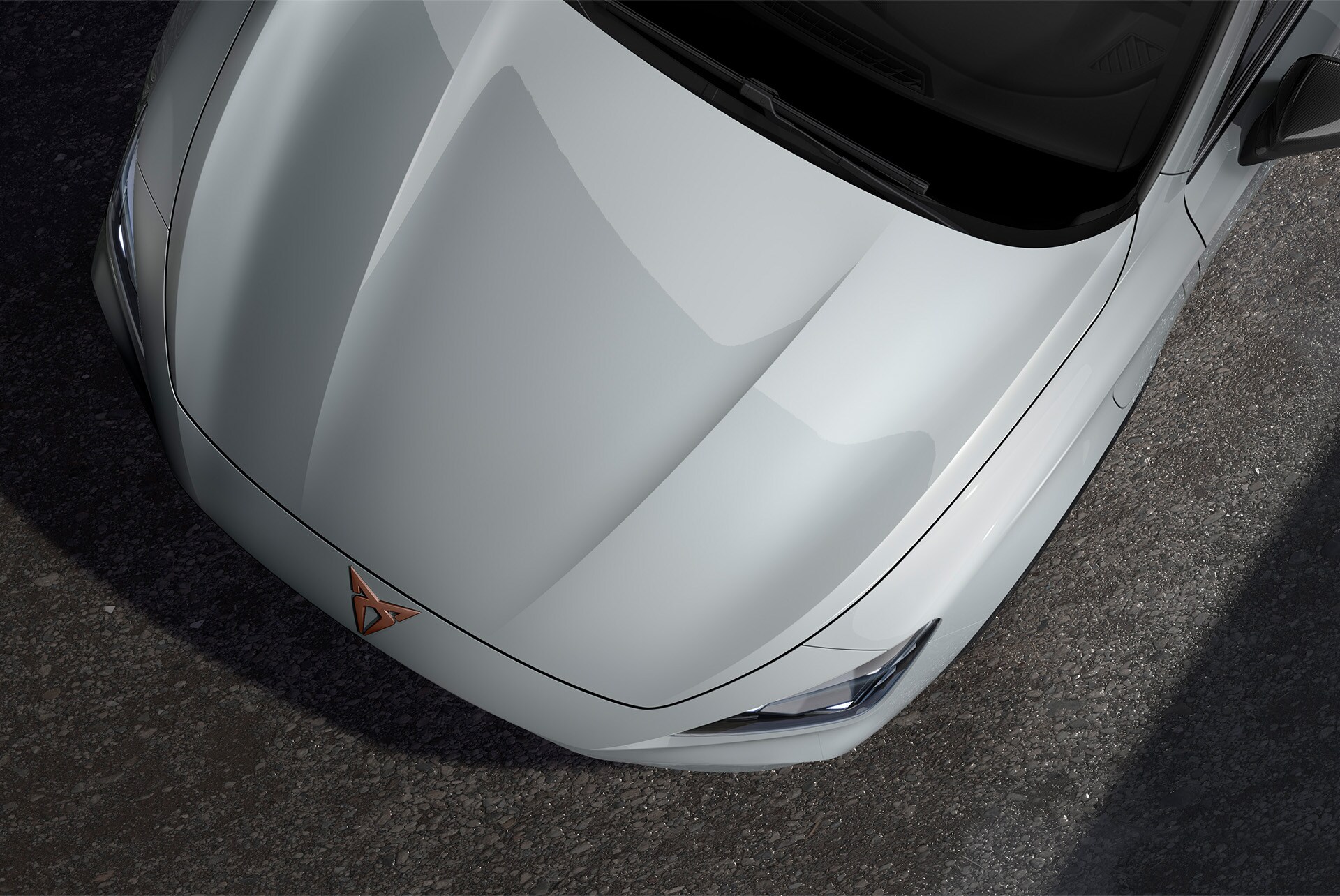 Upper shot of the front nose of the CUPRA Formentor in Glacial White with metallic finish.