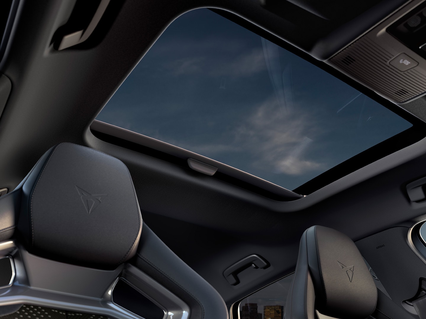Interior view of the CUPRA Leon's panoramic sunroof, that extends the sky indoors in every ride.