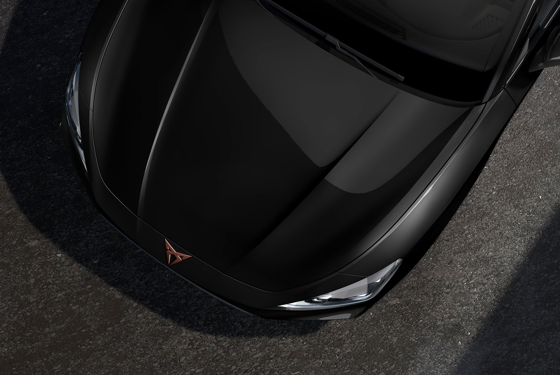 bird’s eye view of a midnight black new cupra leon 2025 car hood