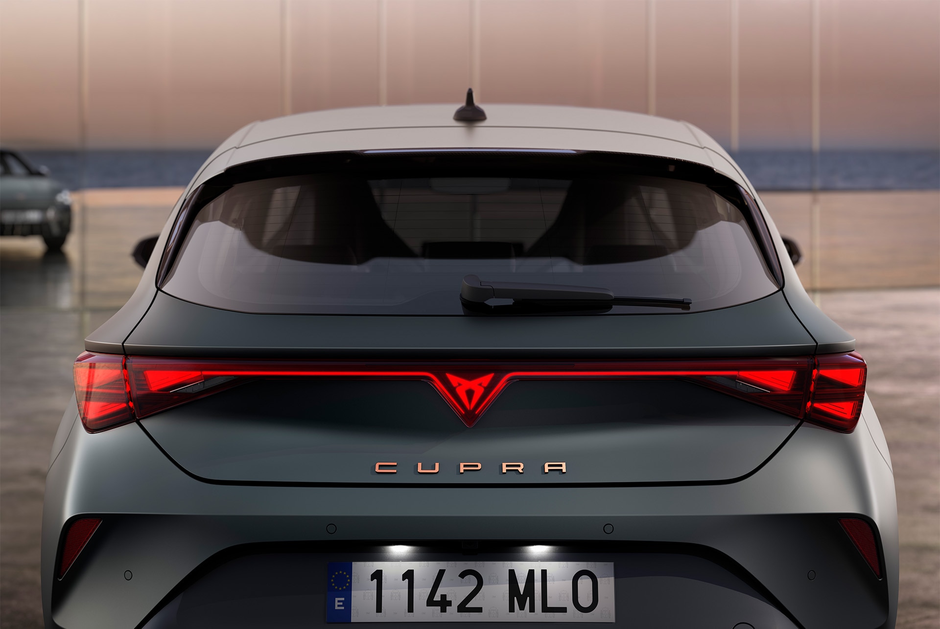 view of new cupra leon 2025 hybrid car's boot and rear lights, LED lighting, integrated led cupra logo