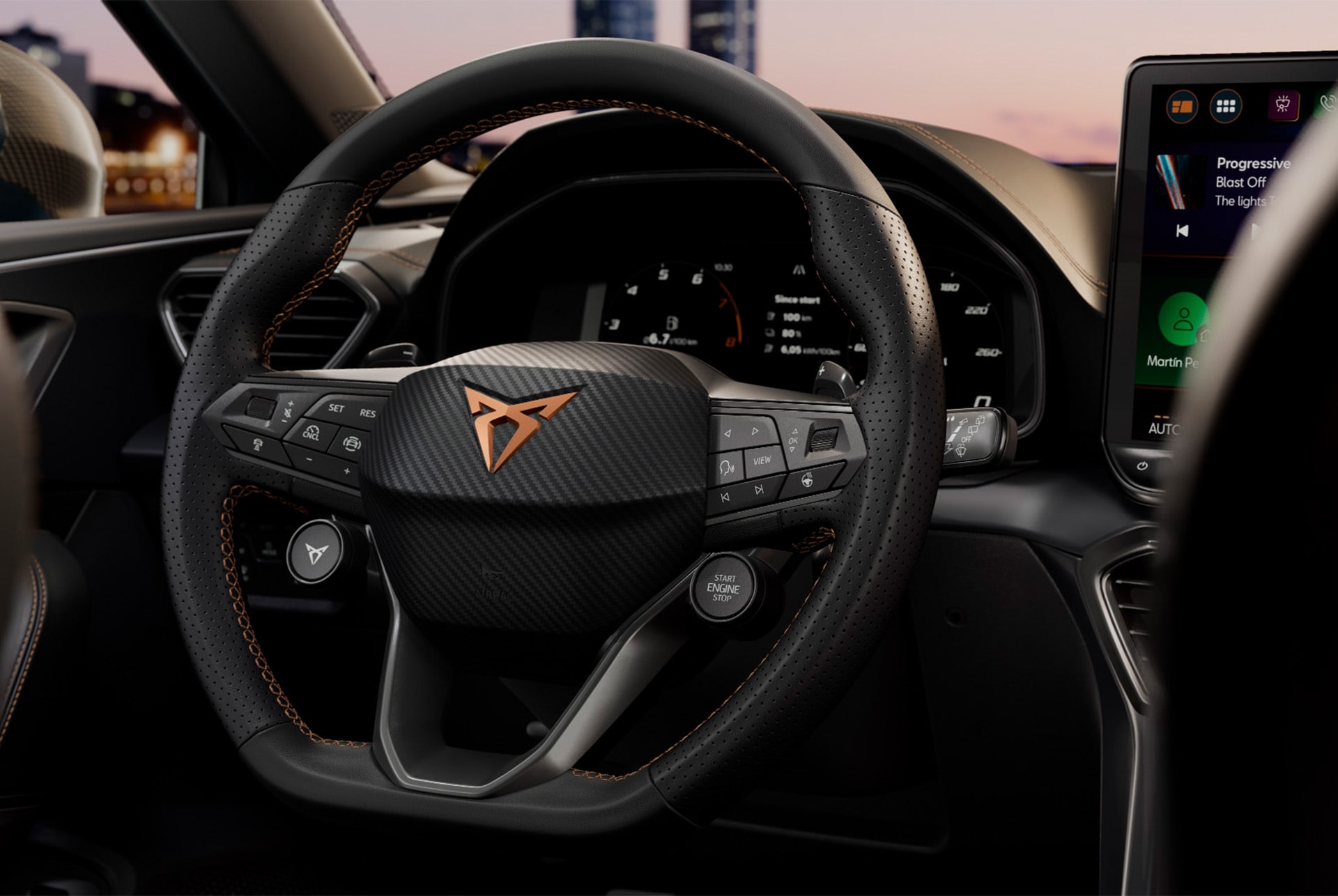close up of new cupra leon 2025 technology, steering wheel with satelite buttons, car cockpit, drivers seat view, wing mirror, infotainment system, dashboard door panel, cupra logo and window.