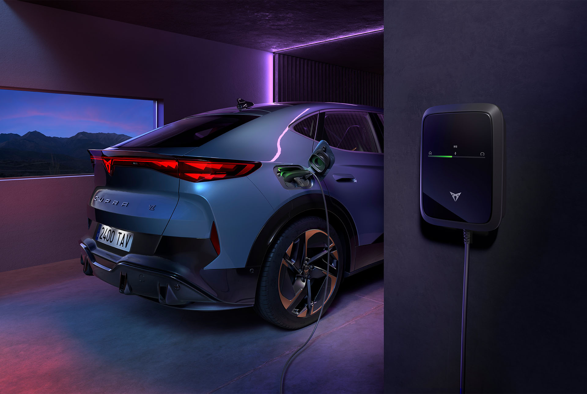 new cupra tavascan in blue, charging with a home vehicle charging station