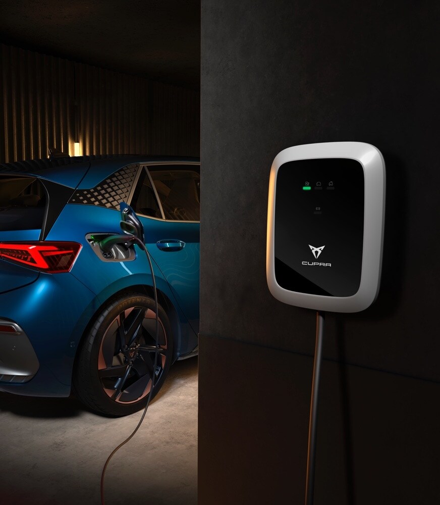 CUPRA%20Born%20Aurora%20blue%20colour%20plugged%20into%20a%20CUPRA%20charger