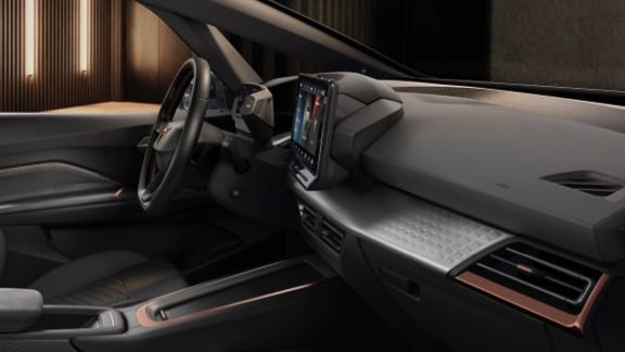 CUPRA Born interior view of the steering wheel and 12” infotainment screen