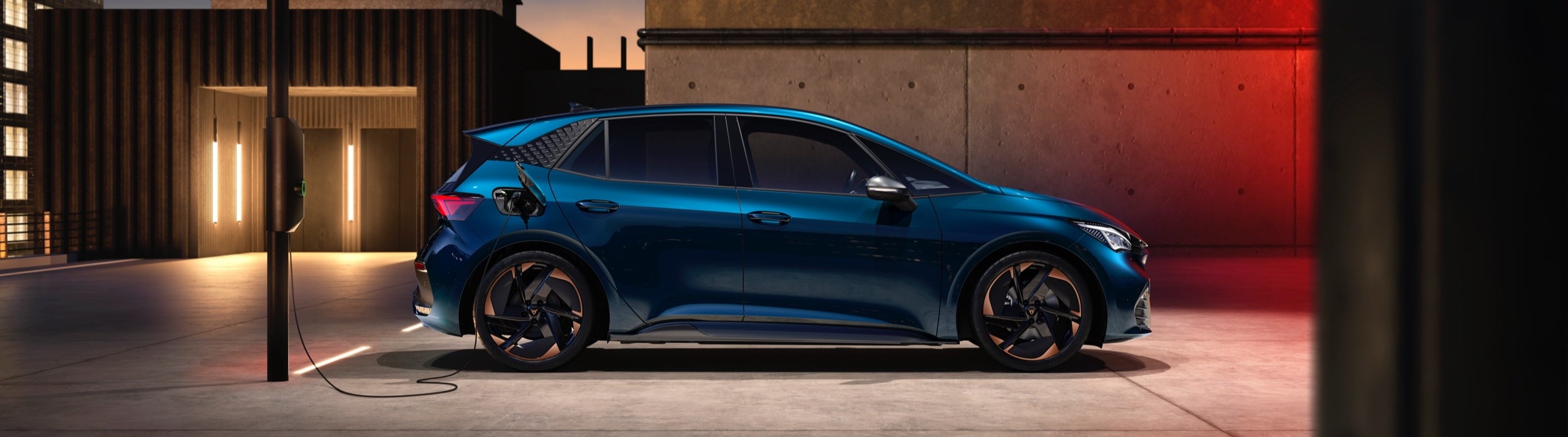 The new CUPRA Born Aurora blue colour at a charging point